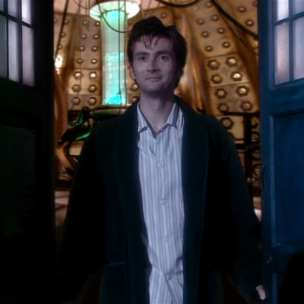 A Freshly Regenerated Tenth Doctor (David Tennant) in borrowed pajamas